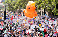 Mass anti-Trump protests held across US as president hosts Washington military parade