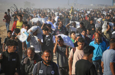 Israeli troops kill 20 Palestinians waiting to collect food, says Gaza's civil defence agency