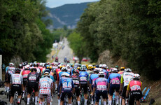 Milan wins crash-marred sprint as Tour approaches Alpine end game