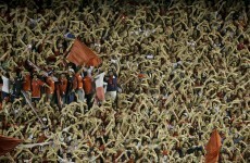 VIDEO: A football match was called off after a fan threw a firecracker at the goalie