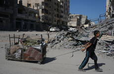 Palestinians return to devastated Gaza City as truce holds