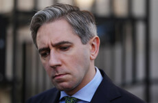 Woman due in court over online threats against Simon Harris and his family