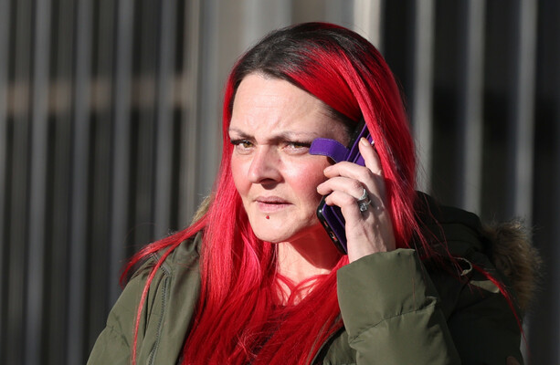Dublin woman charged with sending messages to Simon Harris which threatened his family