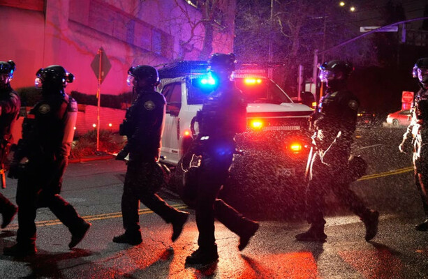 US border agents shoot and wound two people outside hospital in Portland