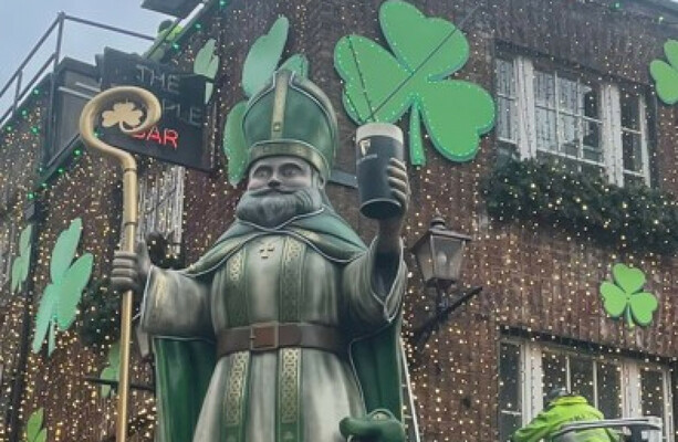 Temple Bar tourist trap pub installs giant St Patrick with a pint, then covers it with a bin bag