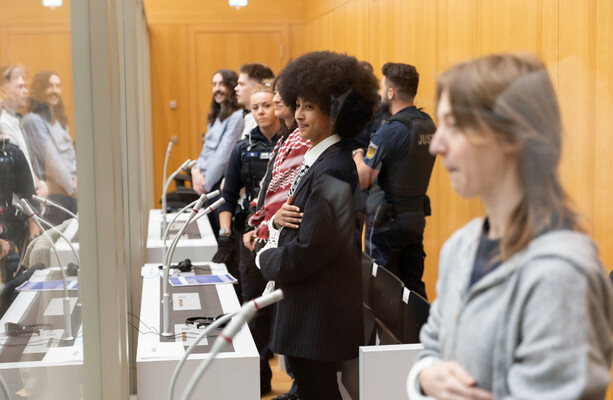 Courtroom Chaos: Trial of Anti-Arms Activists Delayed Amidst Communication Dispute in Germany