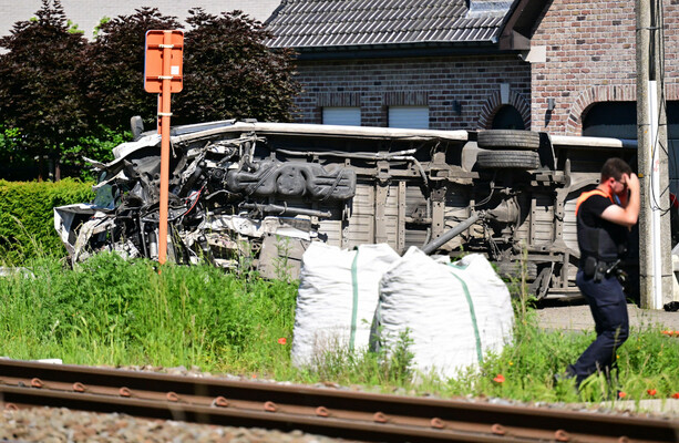 Four dead, including two children, after train collides with school bus ...