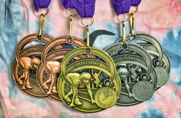 Raising them right: Sport participation medals used to drive me mad until I became a parent