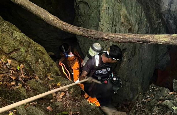 Heavy rains threaten to delay search for last two missing people in flooded Laos cave