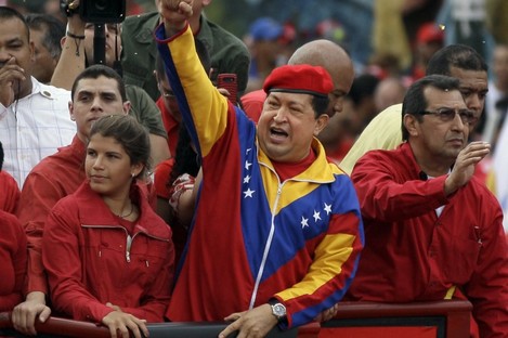 Hugo Chavez waves to a crowd in Caracas earlier this year