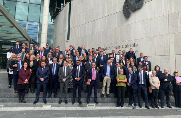 Chaotic court scenes as 100 solicitors stage walk out amid 'flat fee' dispute