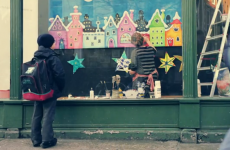 Christmas squee! Kids help to paint Dublin bookshop window