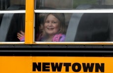 Four days after massacre, children return to school in Newtown