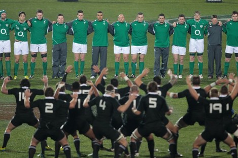 The Irish team face the haka. 