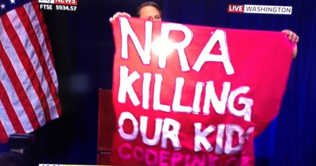 Pic: Protester disrupts National Rifle Association press conference