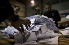 Egypt: Disputed constitution signed into law, elections in two months