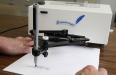 Obama signs 'fiscal cliff' deal into law (with an autopen)