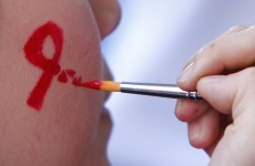 Scientists say vaccine temporarily puts brakes on HIV