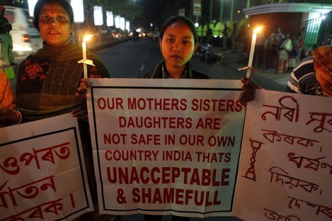Women hold a candlelight vigil in Gauhati, India, last night. 
