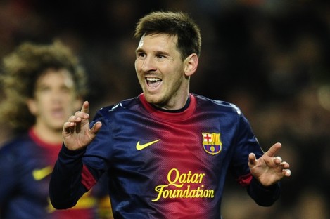 FC Barcelona's Lionel Messi from Argentina celebrates scoring his side's fourth goal against Espanyol.