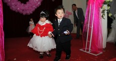 Photos: Hundreds of kids take part in 'group wedding'