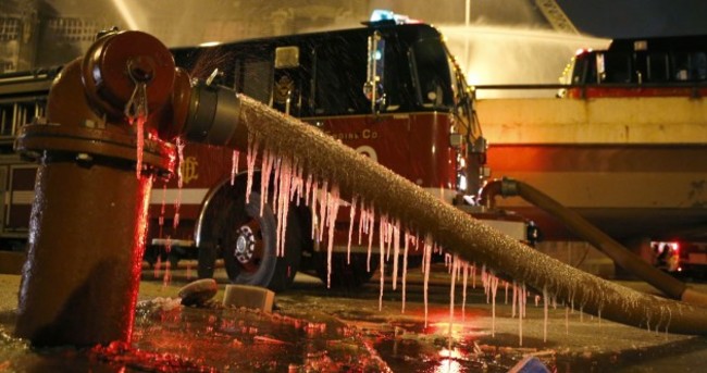 Photos: Firefighters battle blaze at freezing Chicago warehouse