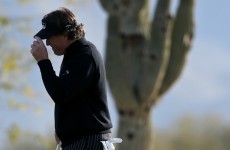 VIDEO: Phil Mickelson's birdie putt for a 59 rolled around the inside of the cup and lipped out