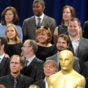 Who is the woman wearing cat ears in the Oscar Nominees photograph?