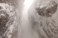VIDEO: Scary footage of snowboarder slipping into rock crevice