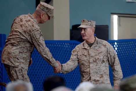 US Marine Gen. Joseph F Dunford, right, shakes hand with outgoing NATO commander US Gen John Allen, left.