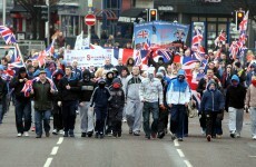 Three people charged following loyalist flag protest