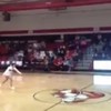 VIDEO: Check out this cheerleader make a front-flip, half-court shot last night