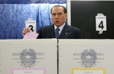 Italy: Topless protesters hurl themselves at Berlusconi