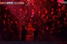 VIDEO: Real Madrid fans throw flare at Barcelona supporters