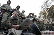 Army dissolves Egypt's parliament as protests continue