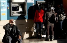 Cyprus postpones crucial vote on unpopular bailout until Tuesday
