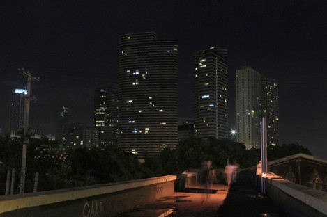 Few lights remain switched on for an hour in the financial district of Makati city, east of Manila in the Philippines, during last year's Earth Hour.