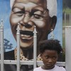 Mandela in 'good spirits' despite hospital stay