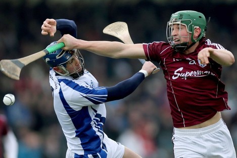  Waterford's Shane Fives and Niall Burke of Galway.