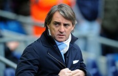 Which Manchester City player would Roberto Mancini like to punch?