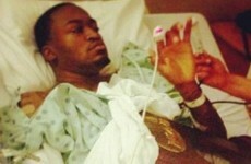 Kevin Ware holds Louisville's Final Four trophy following two-hour surgery on broken leg