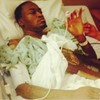 Kevin Ware holds Louisville's Final Four trophy following two-hour surgery on broken leg
