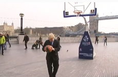 Boris Johnson pulls off basketball trick shot... wearing a suit