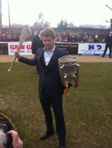 Romeo from Home and Away gets his hands on the Liam MacCarthy Cup in Kilkenny