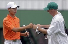 Controversial penalty leaves 14-year-old Guan in danger of missing historic Masters cut
