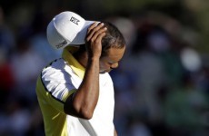 Jason Day leads Masters as Woods falters
