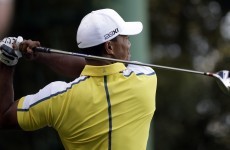 Tiger Woods stays in the Masters, gets two-shot penalty
