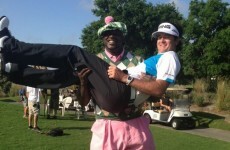 Here's a picture of Shaq holding Bubba Watson like a baby