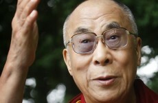 Dalai Lama crosses Derry Peace Bridge with Catholic and Protestant children