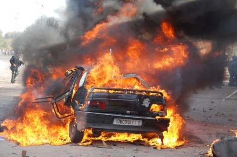A burning car during a demonstration in Marrakech in one of a string of nationwide protests that brought thousands to the streets across Morocco on Sunday Feb. 20, 2011. 